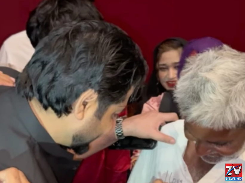 Imran Ashraf warmly greets and chats with an elderly fan during a live show, creating an emotional and heartwarming moment for the audience.