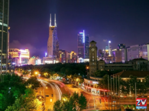 Visitors walk through AI technology displays at a major artificial intelligence conference in Shanghai ahead of the event running from July 17 to 20.